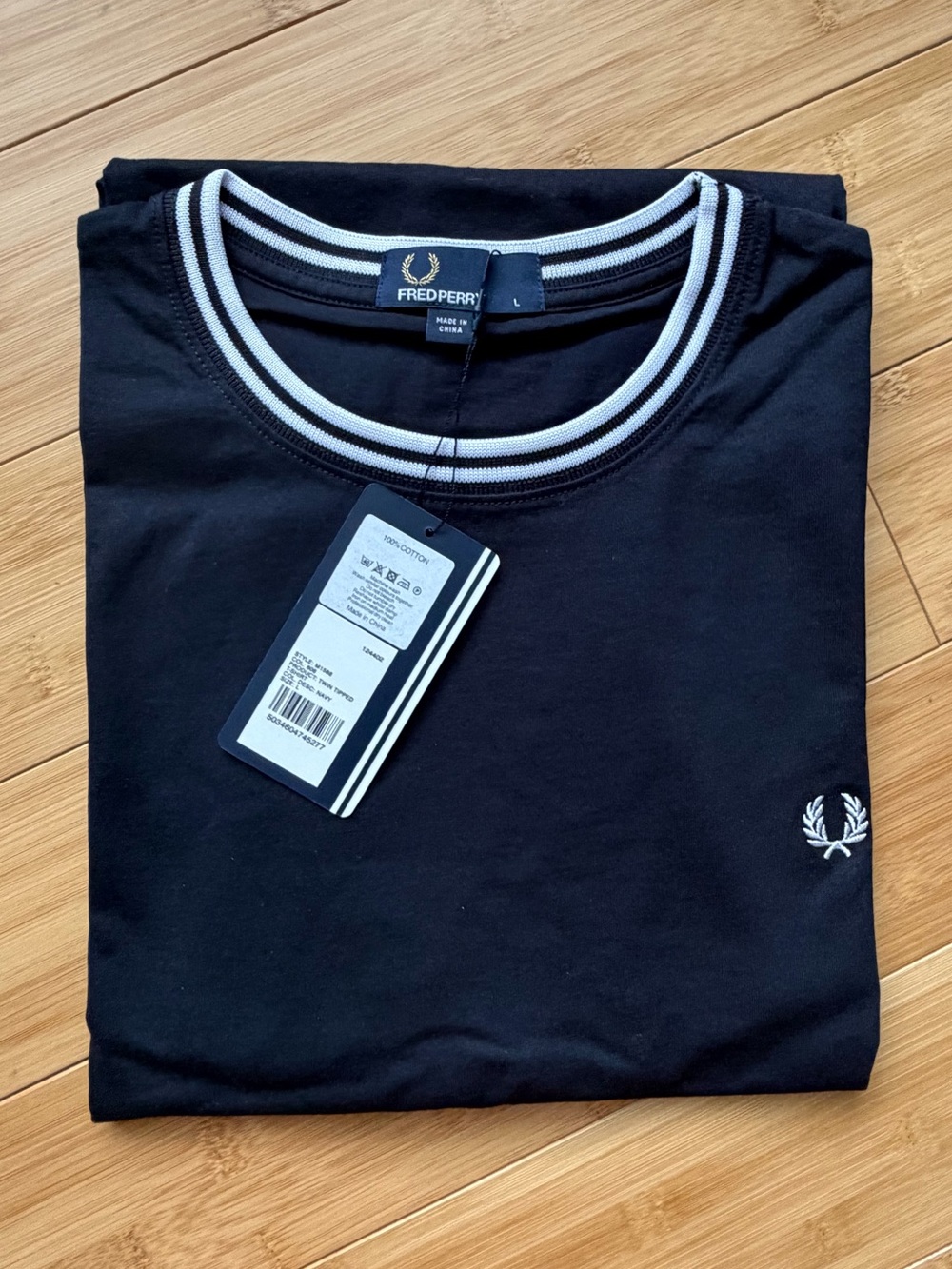 Fred Perry Navy Twin-Tipped T-shirt.